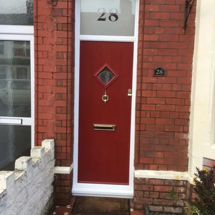 red front door with diamond glazed panel