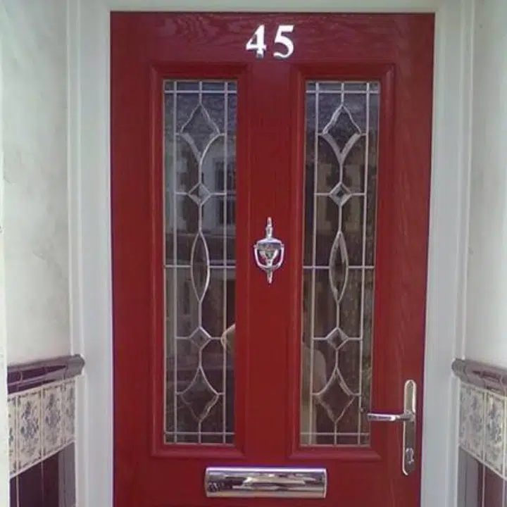 red front door with silver letter box