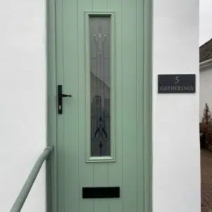 modern front door with stained glass