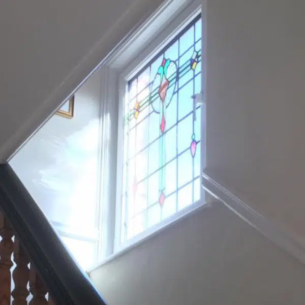 stunning light coming through stained glass window