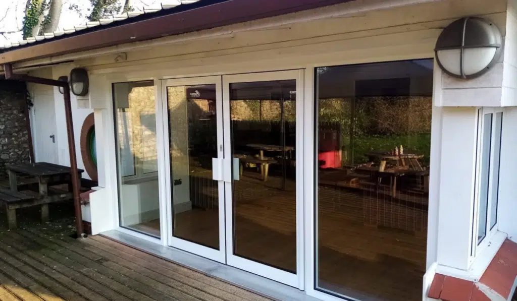 white aluminium french doors with side glazing