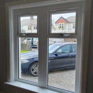 white upvc windows with top opening toplights