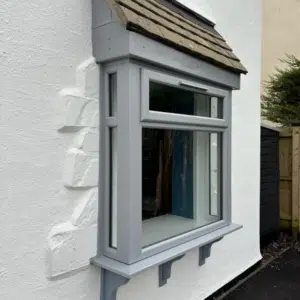 upvc grey windows on retrofit box bay