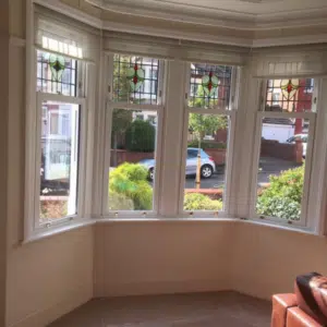 upvc sash windows with staind glass top sashes