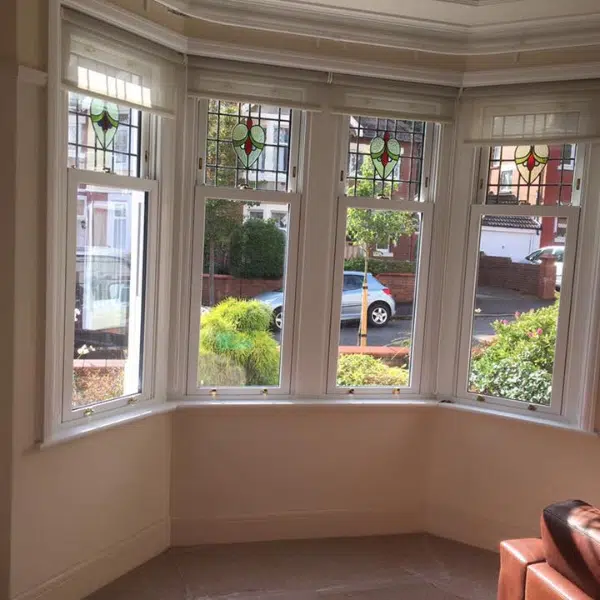 upvc sash windows with staind glass top sashes