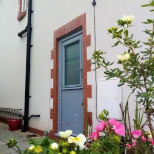 blue composite back door with glazed top