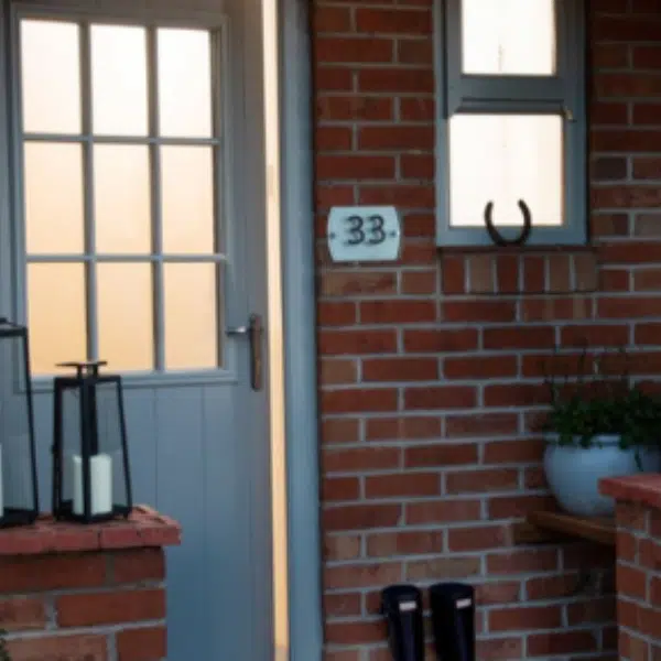 blue farmhouse style stable back door with georgian top half