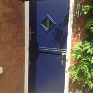 blue stable door with diamond glazed panel