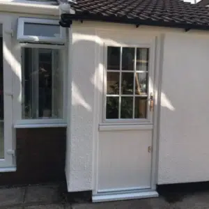 white farmhouse style stable back door with georgian top half